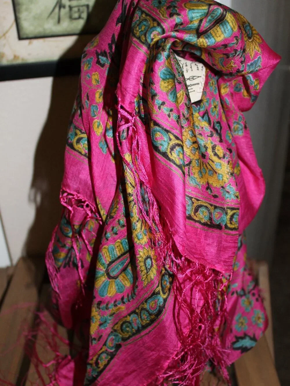 Bright silk scarf.